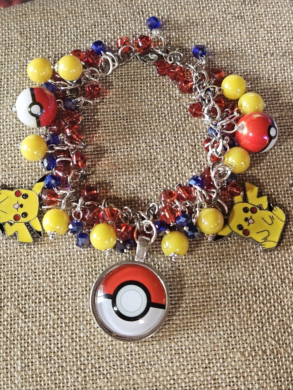 Pokémon Poké Ball Cha Cha Charm Bracelet with Pikachu Charms